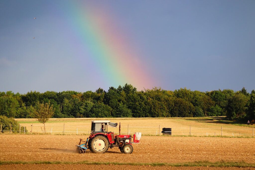 tractor, rainbow, field-5538933.jpg